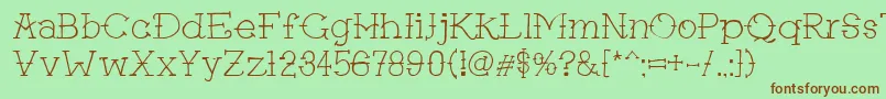 Tattgf Font – Brown Fonts on Green Background