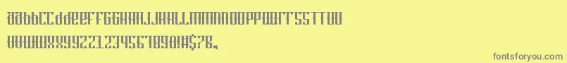 WristTat-Schriftart – Graue Schriften auf gelbem Hintergrund