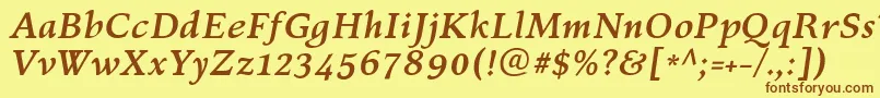 フォントKelvinchBolditalic – 茶色の文字が黄色の背景にあります。