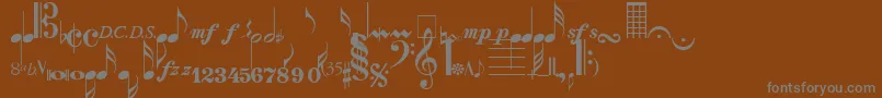 NotesNormal-fontti – harmaat kirjasimet ruskealla taustalla