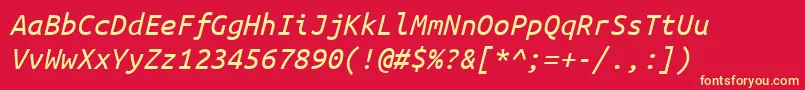 Fonte Ubuntumono Italic – fontes amarelas em um fundo vermelho