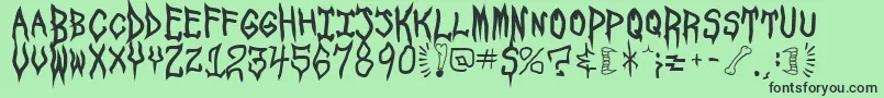 Шрифт SpookshowUndead – чёрные шрифты на зелёном фоне