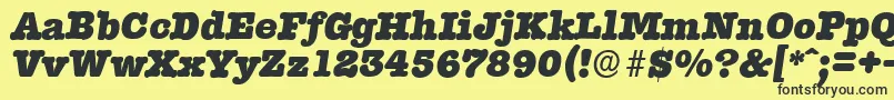 Шрифт TypewriterserialHeavyItalic – чёрные шрифты на жёлтом фоне