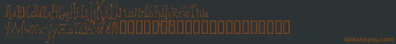 Dreadlox-fontti – ruskeat fontit mustalla taustalla