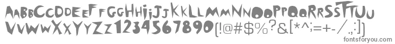 フォントOutback – 白い背景に灰色の文字