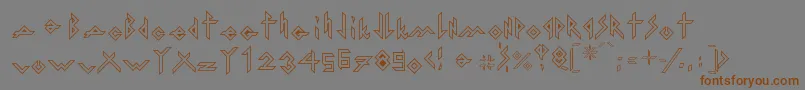 フォントIronHMetalOutline – 茶色の文字が灰色の背景にあります。