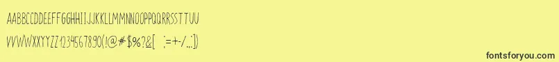Zokhan Font – Black Fonts on Yellow Background