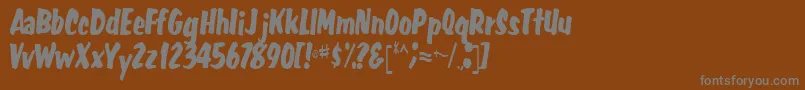 FatRegular Font – Gray Fonts on Brown Background