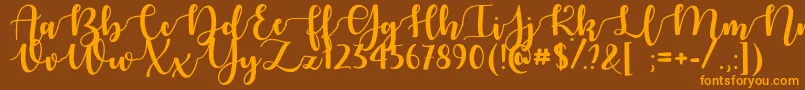 AutumnInNovemberTtf-Schriftart – Orangefarbene Schriften auf braunem Hintergrund