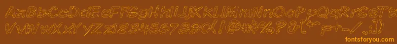 Komikskt Font – Orange Fonts on Brown Background
