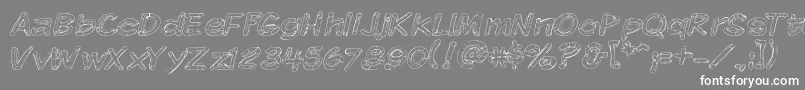 フォントKomikskt – 灰色の背景に白い文字