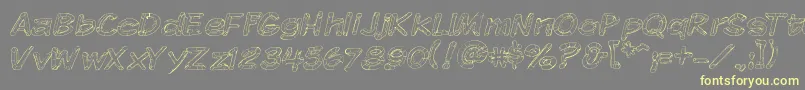 Komikskt Font – Yellow Fonts on Gray Background