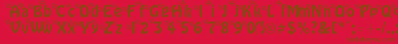 Fonte ThreeLittlePinkPigs – fontes marrons em um fundo vermelho