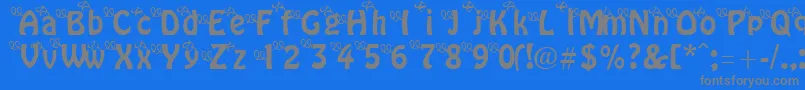 ThreeLittlePinkPigs-Schriftart – Graue Schriften auf blauem Hintergrund
