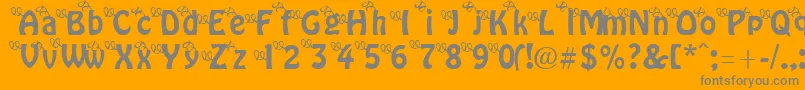 Weitere Informationen zur ThreeLittlePinkPigs-Schriftart ThreeLittlePinkPigs-Schriftart – Graue Schriften auf orangefarbenem Hintergrund