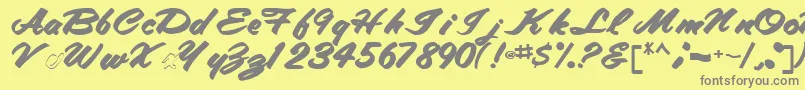 Fonte Tracytracy68Bold – fontes cinzas em um fundo amarelo