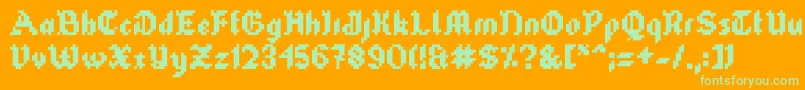 Tubeofcorn Font – Green Fonts on Orange Background