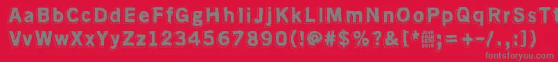 フォントAlmostLikeTheBlues – 赤い背景に灰色の文字