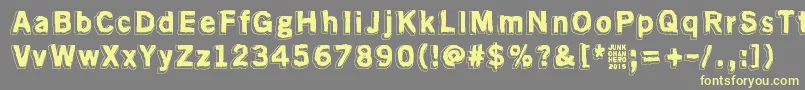 AlmostLikeTheBlues Font – Yellow Fonts on Gray Background