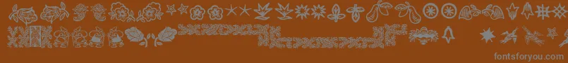 Deutscherschmuck Font – Gray Fonts on Brown Background