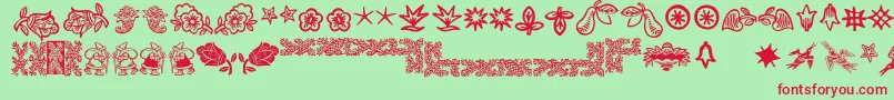 フォントDeutscherschmuck – 赤い文字の緑の背景