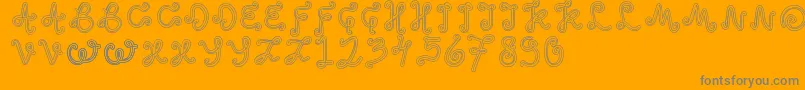 OddEthnic-Schriftart – Graue Schriften auf orangefarbenem Hintergrund