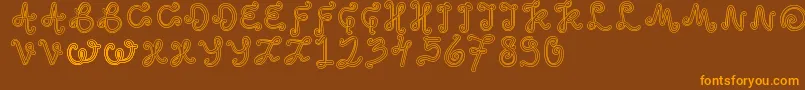 OddEthnic-Schriftart – Orangefarbene Schriften auf braunem Hintergrund