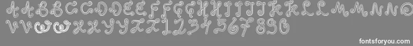 フォントOddEthnic – 灰色の背景に白い文字