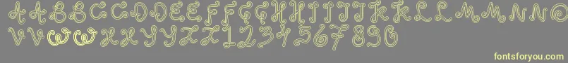 OddEthnic Font – Yellow Fonts on Gray Background