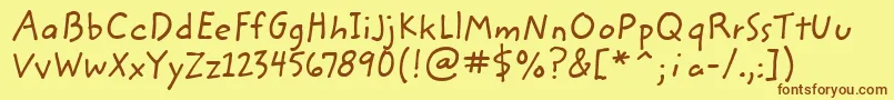 Шрифт ZemkehanditcTt – коричневые шрифты на жёлтом фоне