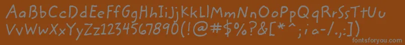 Шрифт ZemkehanditcTt – серые шрифты на коричневом фоне