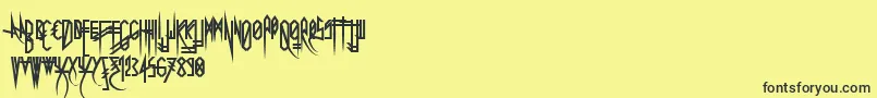 Uglymann Font – Black Fonts on Yellow Background