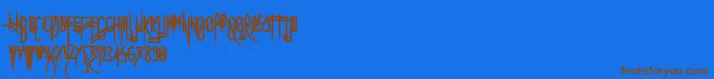 Uglymann Font – Brown Fonts on Blue Background
