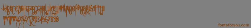 Uglymann Font – Brown Fonts on Gray Background