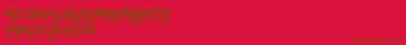Uglymann Font – Brown Fonts on Red Background