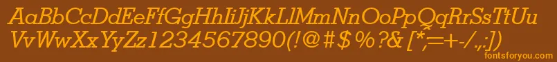 StymieItalic-fontti – oranssit fontit ruskealla taustalla