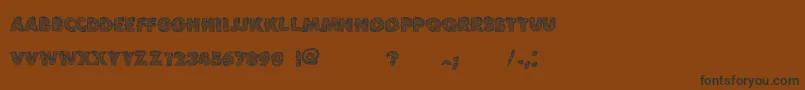 フォントVtksLoveandpeace – 黒い文字が茶色の背景にあります
