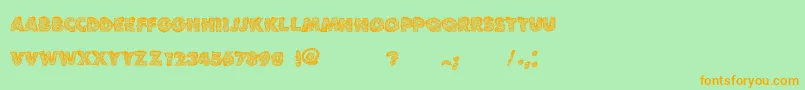 VtksLoveandpeace-Schriftart – Orangefarbene Schriften auf grünem Hintergrund