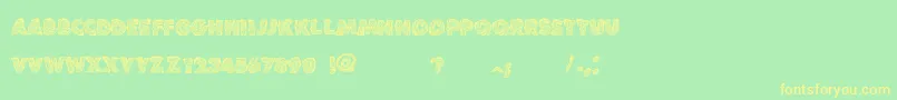 VtksLoveandpeace Font – Yellow Fonts on Green Background