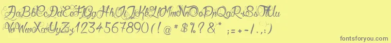 GueulesDeLoup-Schriftart – Graue Schriften auf gelbem Hintergrund