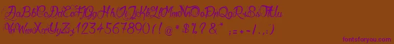 Więcej informacji o czcionce GueulesDeLoup Czcionka GueulesDeLoup – fioletowe czcionki na brązowym tle