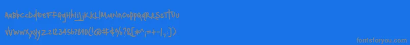 フォントBmdNotepaperAirplanes – 青い背景に灰色の文字