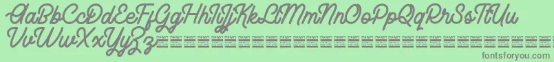 RhaikaneDemo Font – Gray Fonts on Green Background