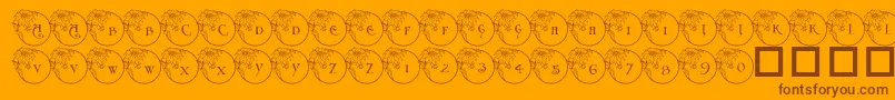 PfXmasFlower1-Schriftart – Braune Schriften auf orangefarbenem Hintergrund