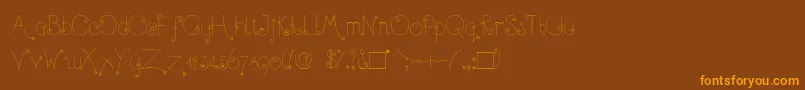 TwinkleFairy Font – Orange Fonts on Brown Background