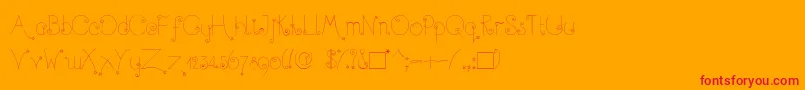 TwinkleFairy-Schriftart – Rote Schriften auf orangefarbenem Hintergrund