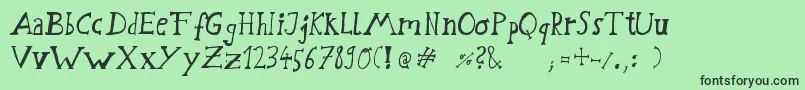 フォントSchwabstrasse – 緑の背景に黒い文字