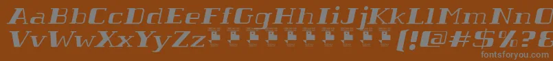 TabaibaWildItalicPersonalUse-fontti – harmaat kirjasimet ruskealla taustalla
