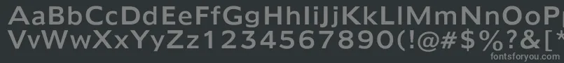 Humana970-fontti – harmaat kirjasimet mustalla taustalla