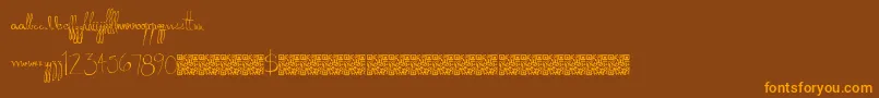 フォントDonkeypunch – オレンジ色の文字が茶色の背景にあります。